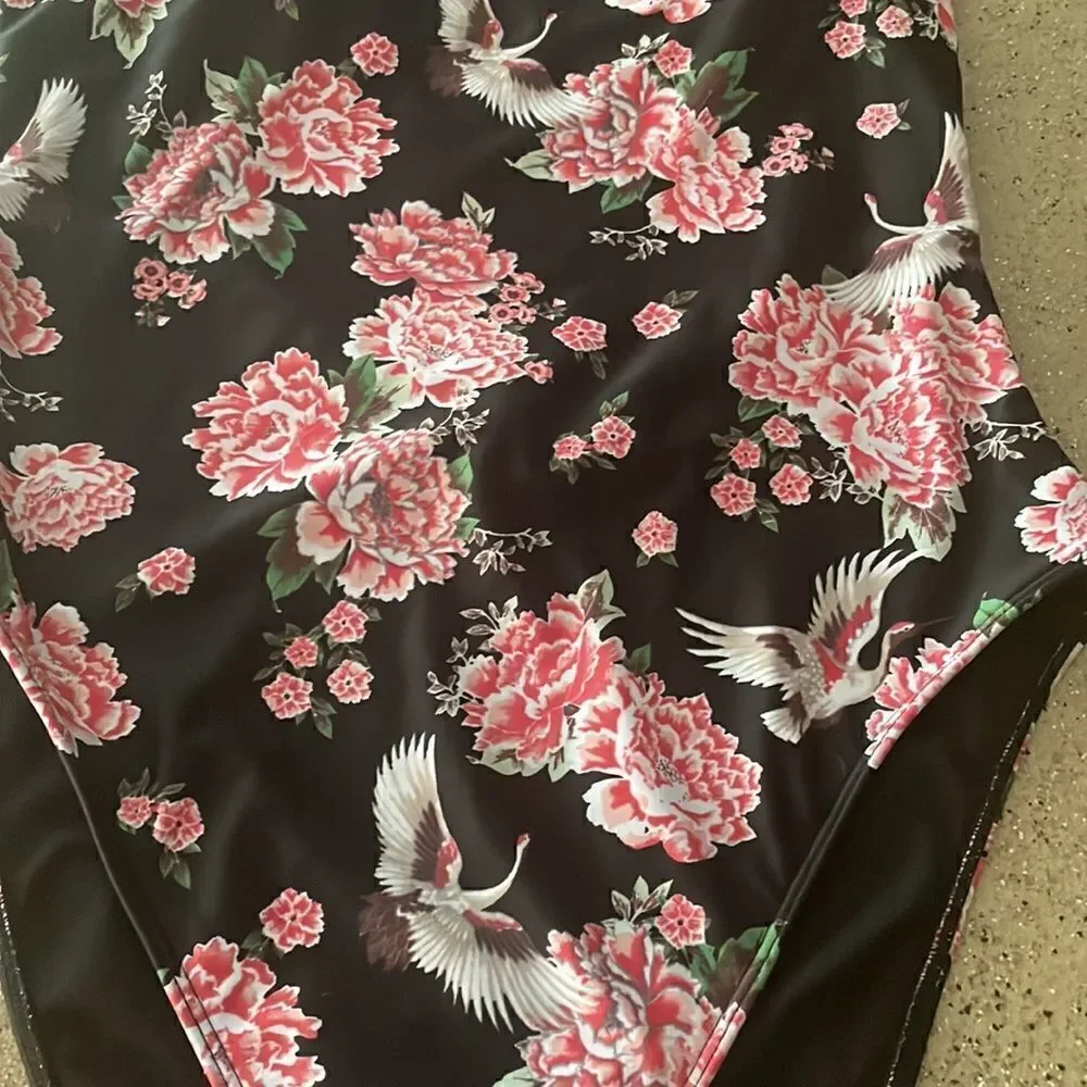 Black halter neck one piece swimsuit with roses and cranes print